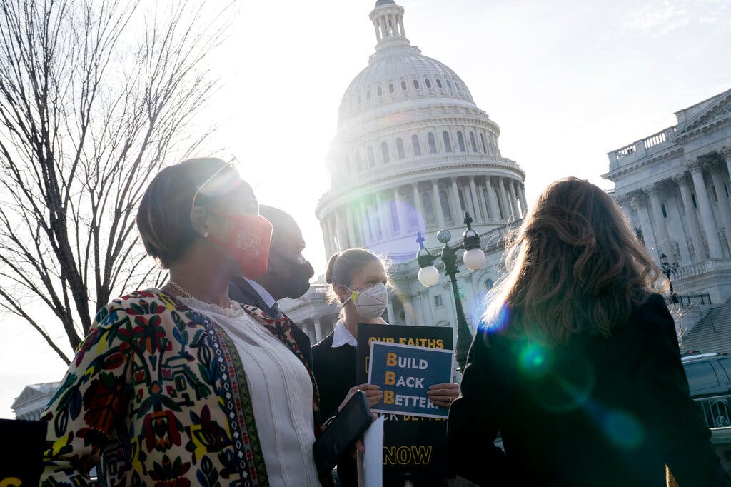 Climate activists in front of Congress